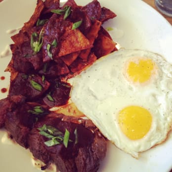 Early Bird - Medium rare steak with chilaquiles. - New American Near Me - Fullerton, California Early Bird - Medium rare steak with chilaquiles. - New American Near Me - Fullerton, California