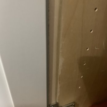 The Home Depot - Added on face frame wood to repair cabinet. Notice deep scratches. Hinges in added on wood will fail in time. - Hardware Stores Near Me - Westbury, New York