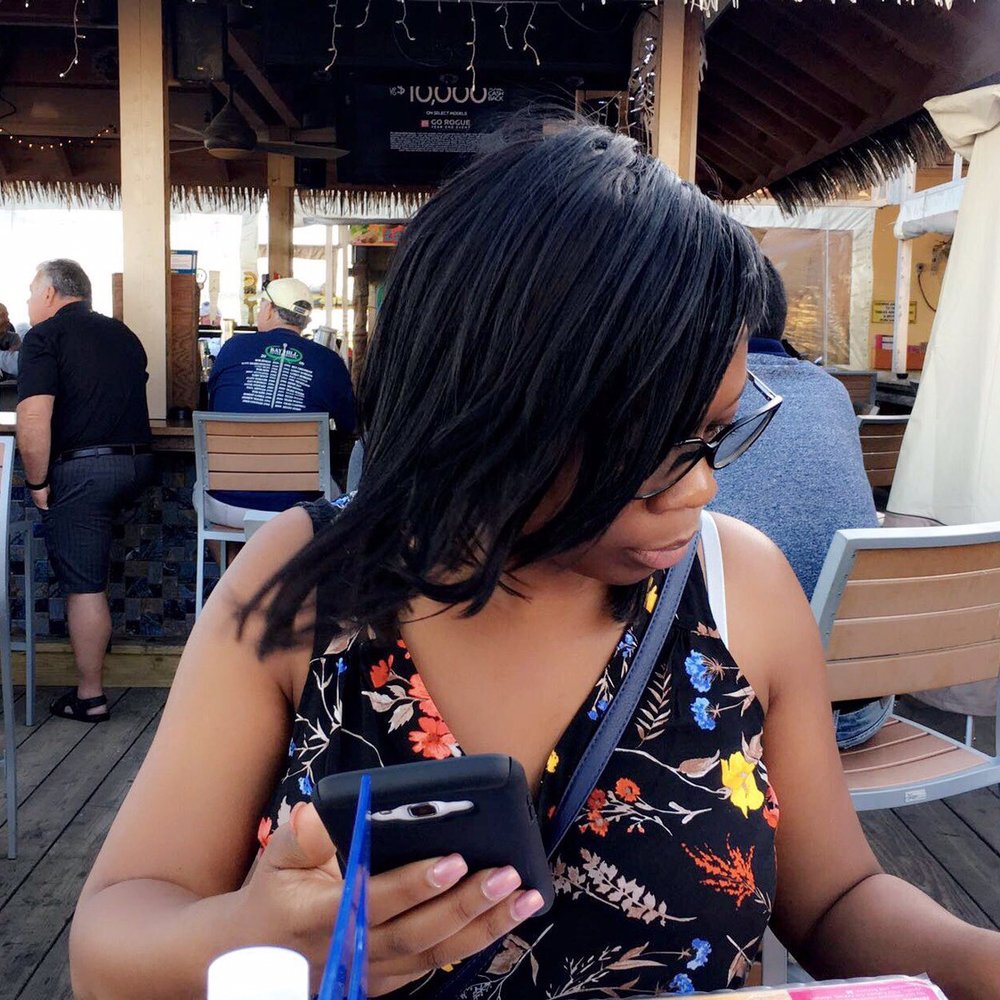 Coconuts On The Beach - My sister perusing the menu - Bars Near Me - Cocoa Beach, Florida