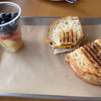 Chicot Coffee And Cafe - Turkey, bacon, avocado, cheese panini with fruit cup - Cafes Near Me - Lake Village, Arkansas Chicot Coffee And Cafe - Turkey, bacon, avocado, cheese panini with fruit cup - Cafes Near Me - Lake Village, Arkansas