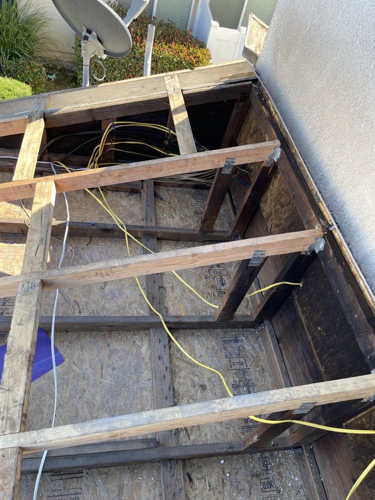 Slide of Oscar Roofing  services