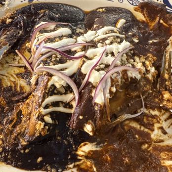 Frida Mexican Cusine - Enchiladas mole negro y poblano - Mexican Near Me - Beverly Hills, California Frida Mexican Cusine - Enchiladas mole negro y poblano - Mexican Near Me - Beverly Hills, California
