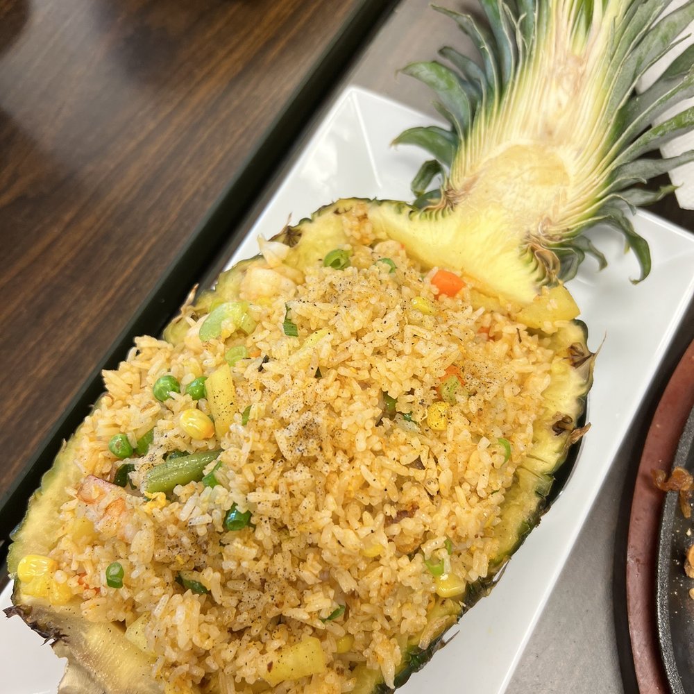 Bun & Oc Everett - a pineapple filled with rice and vegetables - Vietnamese Near Me - Everett, Washington Bun & Oc Everett - a pineapple filled with rice and vegetables - Vietnamese Near Me - Everett, Washington