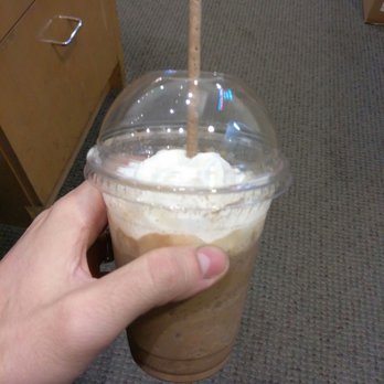 Steps Of Rome - a hand holding a cup of iced coffee - Coffee & Tea Near Me - Carlsbad, California Steps Of Rome - a hand holding a cup of iced coffee - Coffee & Tea Near Me - Carlsbad, California