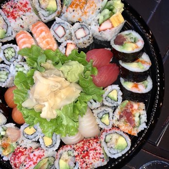 Oko Sushi - a plate of sushi and rolls - Sushi Bars Near Me - Kirkland, Quebec