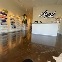 Lumi Skin Bar + Aesthetics - Front lobby and products for sale