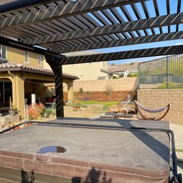 a hot tub in a backyard