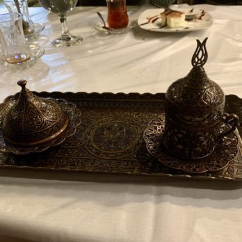 Chop Shish Mediterranean Restaurant - Turkish coffee (rich espresso) presented on intricately designed brass serving tray w/1 Turkish Delight candy under mini dome. - Mediterranean Near Me - Camp Hill, Pennsylvania Chop Shish Mediterranean Restaurant - Turkish coffee (rich espresso) presented on intricately designed brass serving tray w/1 Turkish Delight candy under mini dome. - Mediterranean Near Me - Camp Hill, Pennsylvania