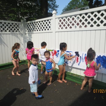 Jack In The Box Schools - Summer is fun when the children paint outdoors! - Child Care & Day Care Near Me - Closter, New Jersey