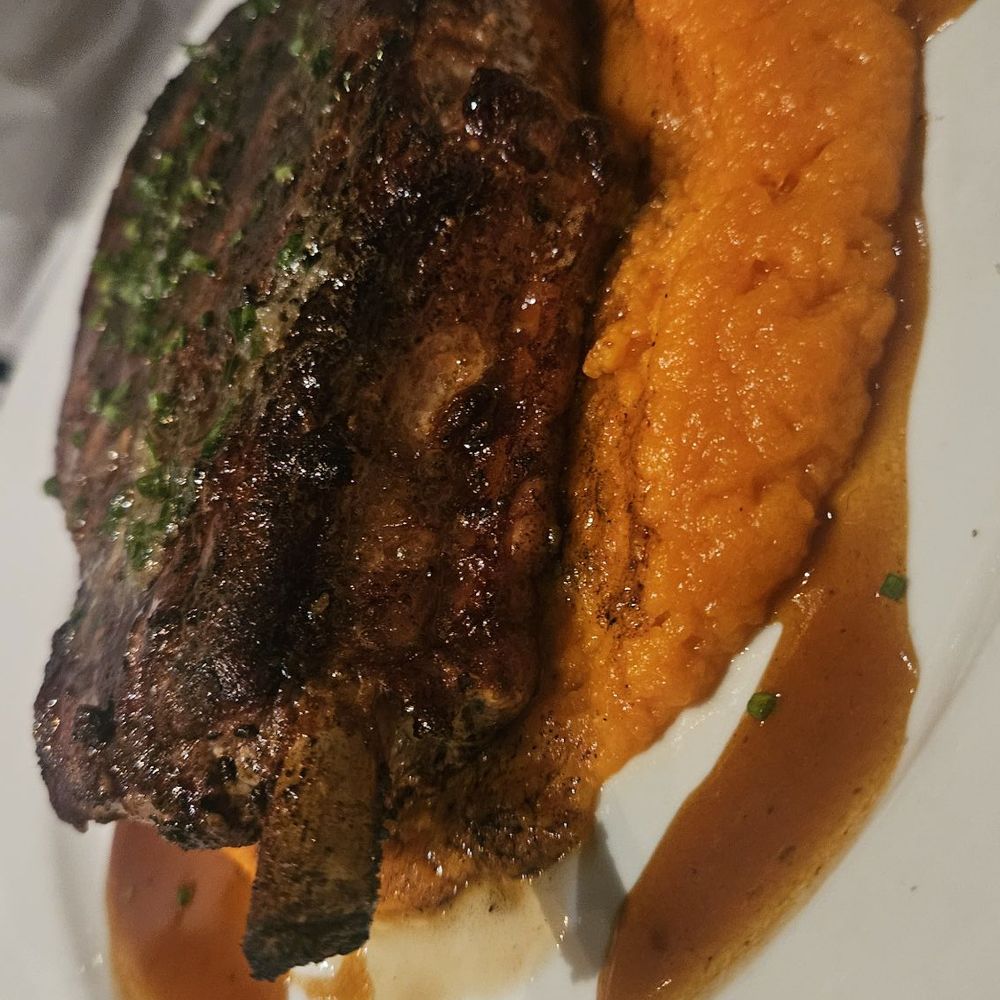 Roaring Fork - Pork chop. My goodness - New American Near Me - Austin, Texas