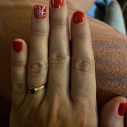 Gel manicure with 1 hand-painted snowflake nail. Gel manicure with 1 hand-painted snowflake nail.