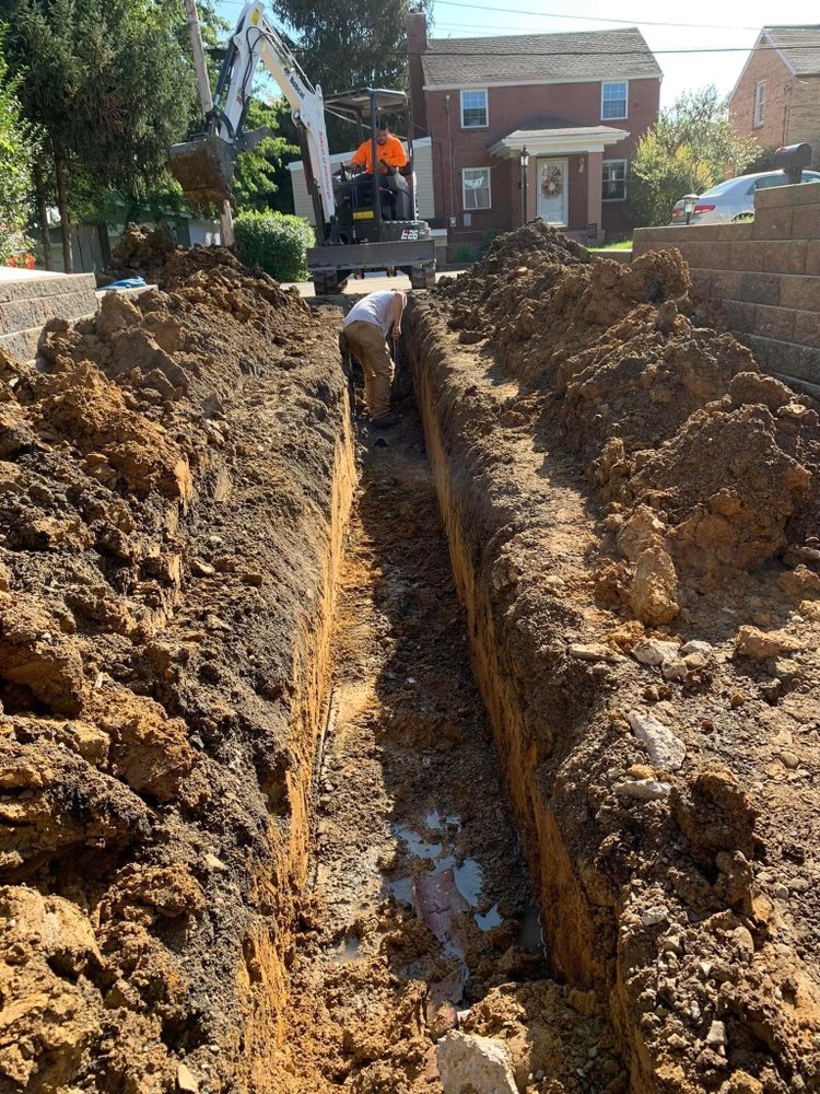 Slide of Freedom Contracting and Excavating