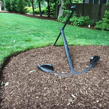 CMEthier Associates, Inc. - an anchor in a mulch bed - Landscaping Near Me CMEthier Associates, Inc. - an anchor in a mulch bed - Landscaping Near Me