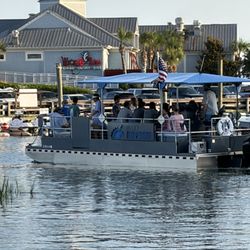 Inlet BrewBoat heading out for a sunset cruise in Murrells Inlet.