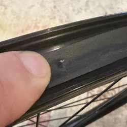 Burr punched through liner