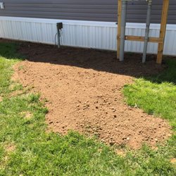 Sam's Tree Service - Screened top soil filled in trenches left by electrical contractor.