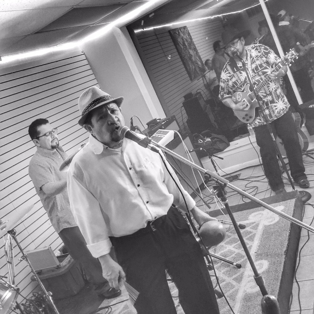 Dairy Mart Plus - a man singing into a microphone - Ice Cream & Frozen Yogurt Near Me - Sterling, Illinois