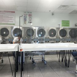 24 Hour Laundromat - Laundry machine in the premises