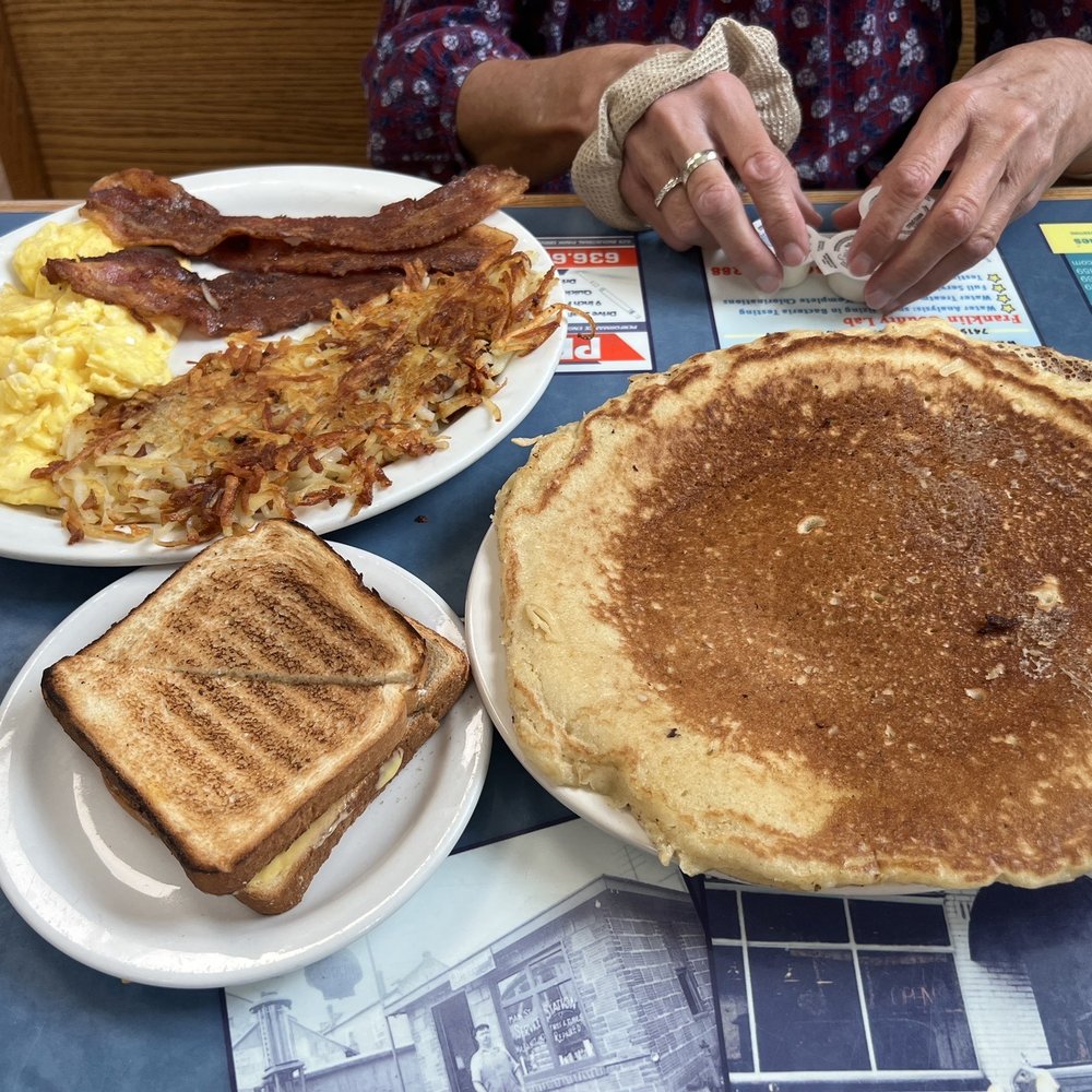 White Rose Cafe - Double scrambled eggs, hash browns, bacon, toast and single pancake - Breakfast & Brunch Near Me - Union, Missouri White Rose Cafe - Double scrambled eggs, hash browns, bacon, toast and single pancake - Breakfast & Brunch Near Me - Union, Missouri