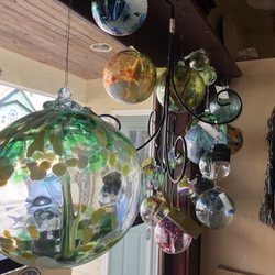 The Peddler House - Art glass window hangings..
