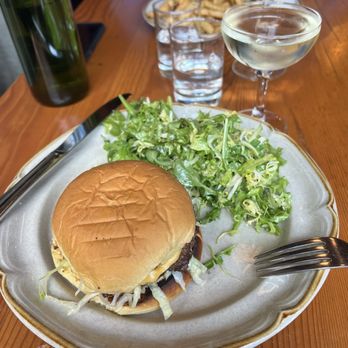 Pourhouse Restaurant - Burger with salad, lemon zesty dressing - Cocktail Bars Near Me - Vancouver, British Columbia Pourhouse Restaurant - Burger with salad, lemon zesty dressing - Cocktail Bars Near Me - Vancouver, British Columbia