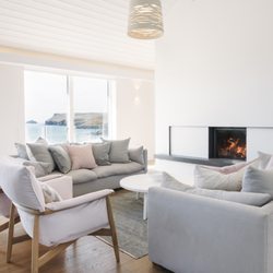 Latitude50 - The lounge at Carn Mar, a self-catering holiday home overlooking Polzeath beach, North Cornwall