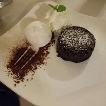 Hukilau Lanai - Worth the wait! Hot choco lava cake with vanilla ice cream. Highly recommended!! It takes 20 mins to make so order it early. - Seafood Near Me - Kapaa, Hawaii