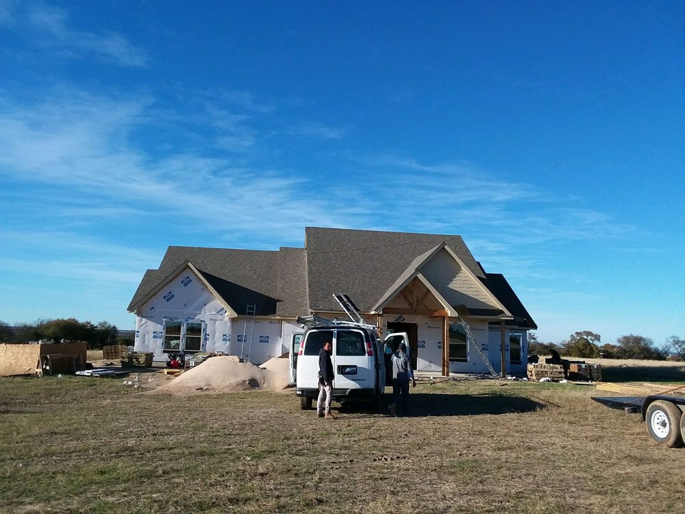 Slide of Rick's Roofing & Construction