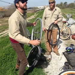 Ninth Ward Rebirth Bike Tours - What a pro; tire repair and history at your service.