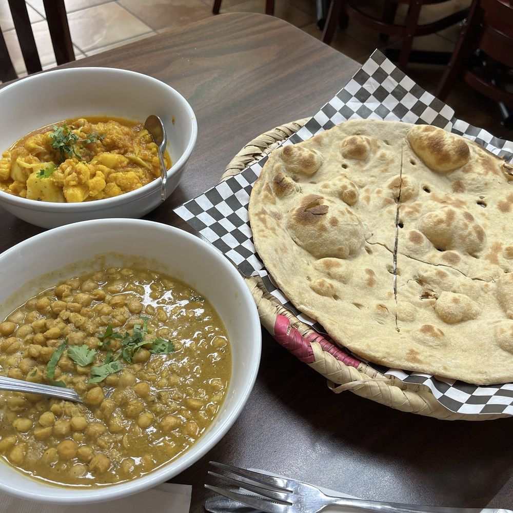 Vegan N’ Chicken 1 - Chana masala and Aloo ghobi. Plain roti. - Pakistani Near Me - Berkeley, California Vegan N’ Chicken 1 - Chana masala and Aloo ghobi. Plain roti. - Pakistani Near Me - Berkeley, California