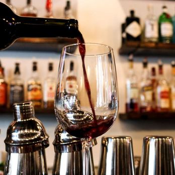 Wine on Third Restaurant and Bar - a bartender pouring a glass of wine - Wine Bars Near Me - Niagara Falls, New York Wine on Third Restaurant and Bar - a bartender pouring a glass of wine - Wine Bars Near Me - Niagara Falls, New York