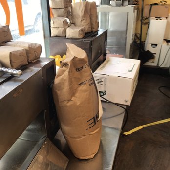 Nuts To You - a bag of nuts on a conveyor belt - Candy Stores Near Me - Philadelphia, Pennsylvania