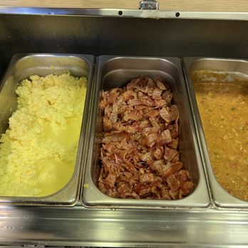 Comfort Inn & Suites - Disgusting breakfast food. Their staple fake eggs in water, undercooked bacon dripping in grease and mystery sauce. - Hotels Near Me - Cheyenne, Wyoming Comfort Inn & Suites - Disgusting breakfast food. Their staple fake eggs in water, undercooked bacon dripping in grease and mystery sauce. - Hotels Near Me - Cheyenne, Wyoming