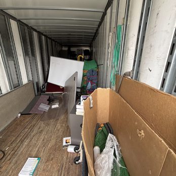 College HUNKS Hauling Junk & Moving - Des Moines - From the back of the truck. Yep, that's the floor you are seeing. - Movers Near Me - Clive, Iowa College HUNKS Hauling Junk & Moving - Des Moines - From the back of the truck. Yep, that's the floor you are seeing. - Movers Near Me - Clive, Iowa