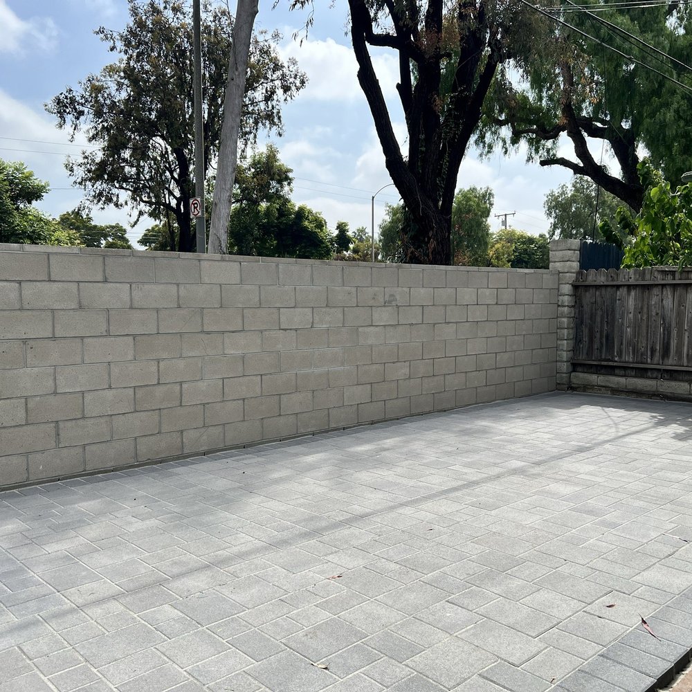 Unique Home Builders - Backyard with pavers and new cinderblock wall. - Masonry/Concrete Near Me - Encino, California