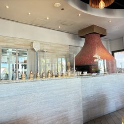 Milano Restaurant & Bar - Interior view towards kitchen and pizza oven