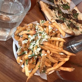 Monti's - Fries with blue cheese and rosemary - Mediterranean Near Me - Santa Rosa, California Monti's - Fries with blue cheese and rosemary - Mediterranean Near Me - Santa Rosa, California