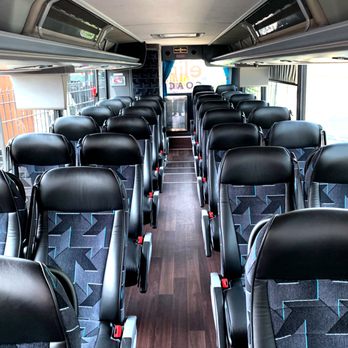Elite Limousine Plus - Interior of our 38 passenger Coach Bus - Limos Near Me - Long Island City, New York Elite Limousine Plus - Interior of our 38 passenger Coach Bus - Limos Near Me - Long Island City, New York