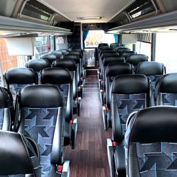 Elite Limousine Plus - Interior of our 38 passenger Coach Bus