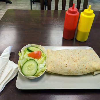 Pam's Roti Shop - Chicken roti + side salad - Caribbean Near Me - Toronto, Ontario Pam's Roti Shop - Chicken roti + side salad - Caribbean Near Me - Toronto, Ontario