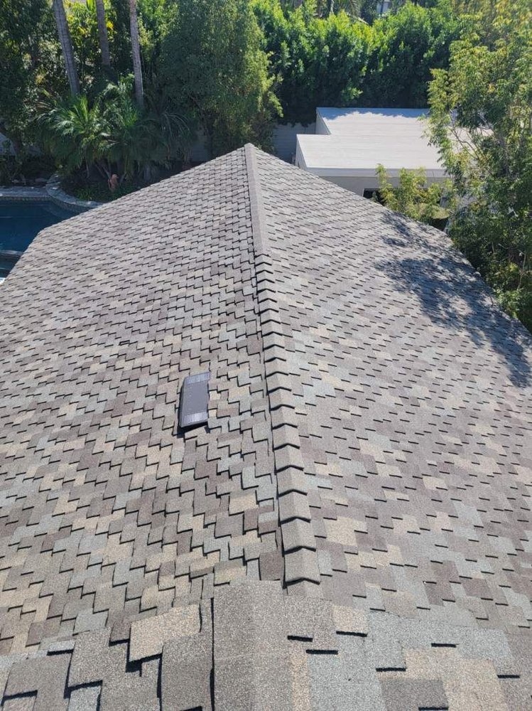 Slide of DV Roofing