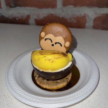Daan Go Cake Lab - Ba-Na-Na - Caramelized Coconut Ganache Banana Caramel Cheesy Mousse Crunchy Base - Macarons Near Me - Toronto, Ontario Daan Go Cake Lab - Ba-Na-Na - Caramelized Coconut Ganache Banana Caramel Cheesy Mousse Crunchy Base - Macarons Near Me - Toronto, Ontario