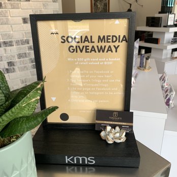 Tonique's Trilogy - Social media give away on front desk - Hair Stylists Near Me - Morgantown, West Virginia
