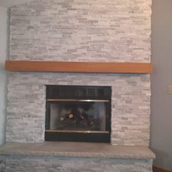 Bisky’s Stucco & Stone - An "after" photo of our fireplace.
