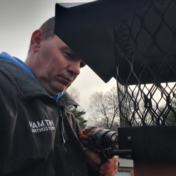 Hit Man Pest Control - Installing of Chimney Cap on roof - Pest Control Near Me Hit Man Pest Control - Installing of Chimney Cap on roof - Pest Control Near Me