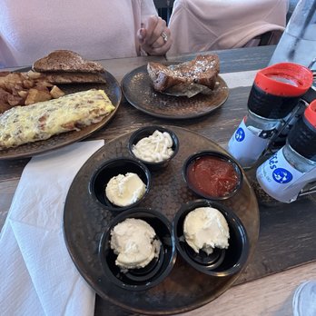 Souffle’s - Fresh sweet butter, special sauce for muffin(the one that looks like mayo) and ketchup. - Breakfast & Brunch Near Me - North Myrtle Beach, South Carolina