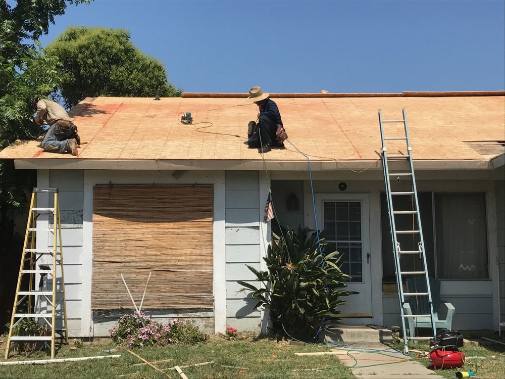 Slide of Husky Roofing