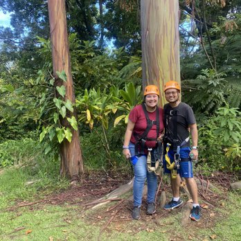 Botanical World Adventures - My husband and I by a rainbow tree. - Botanical Gardens Near Me - Hakalau, Hawaii