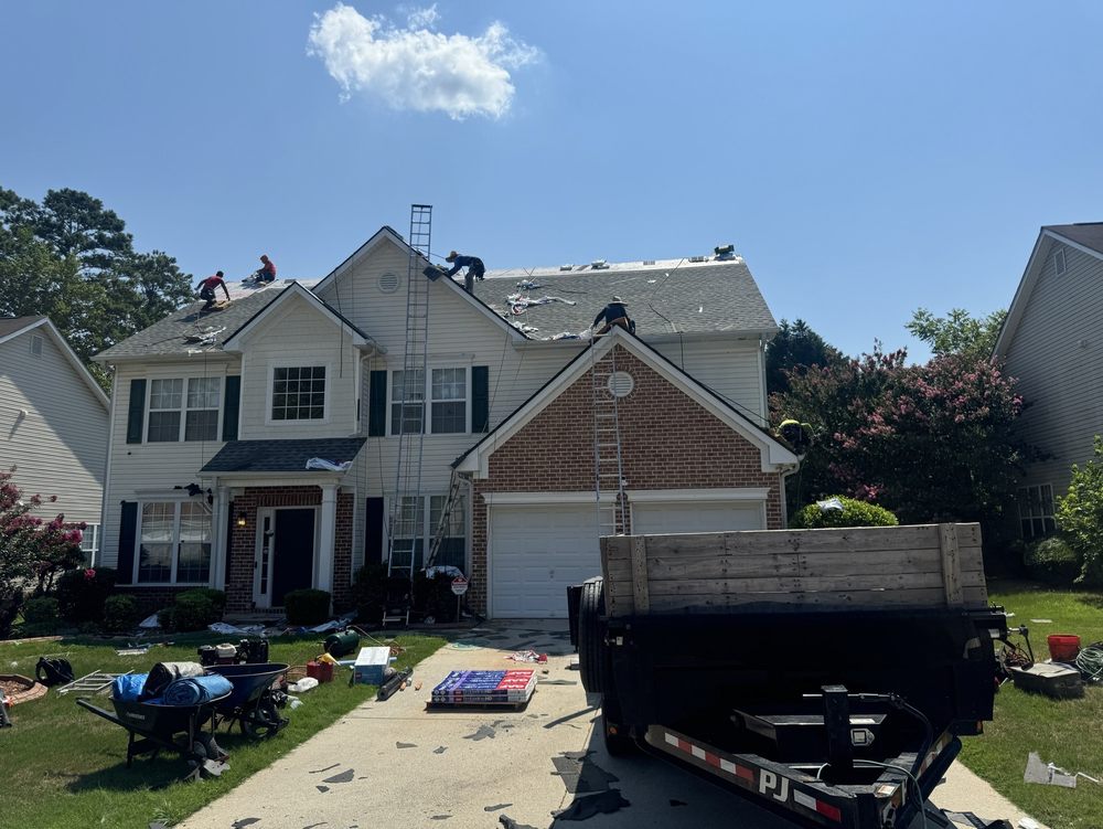 Slide of Mosaic Roofing Company