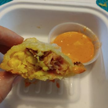 Taco Bamba - Bacon and Egg Empanada with Criolla Sauce on the side. An exceptional breakfast item. - Tacos Near Me - Rockville, Maryland Taco Bamba - Bacon and Egg Empanada with Criolla Sauce on the side. An exceptional breakfast item. - Tacos Near Me - Rockville, Maryland